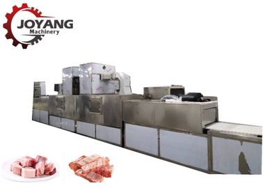 El cerdo congelado de los productos junta las piezas de la máquina del deshielo de la comida con fuente de la microonda